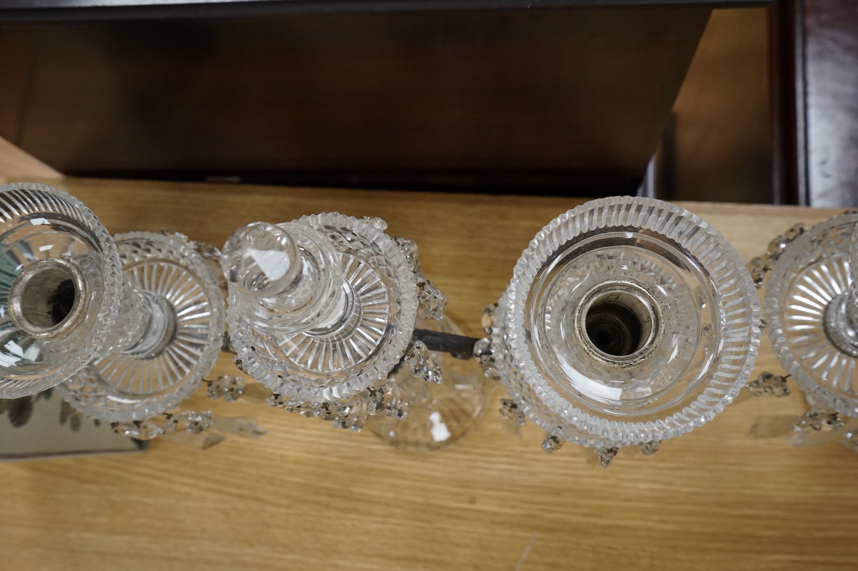 A pair of Victorian cut glass candelabra, probably Perry & Co, in Regency style, for electricity, 38cm